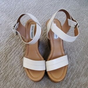 Steve Madden Cream leather straps with wood wedge.